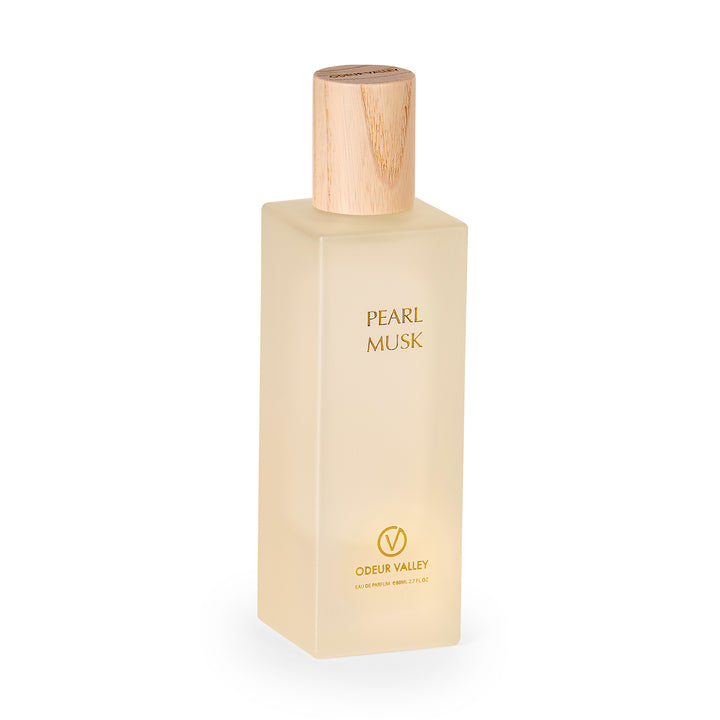 Elegant Pearl Musk Eau de Parfum in frosted glass bottle with gold logo and wooden cap